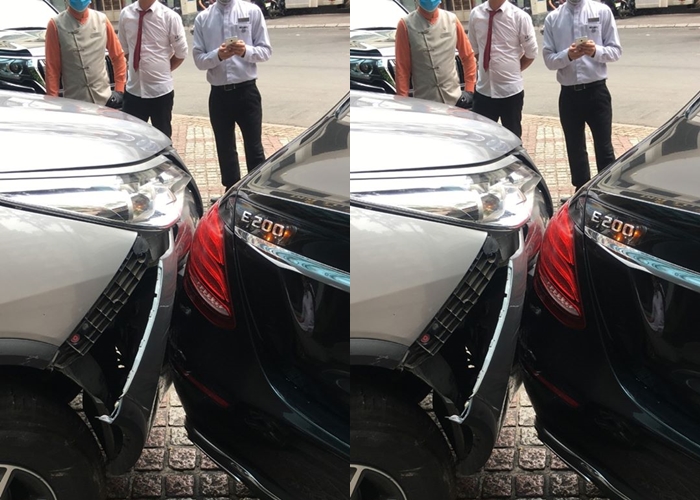 Chiếc Toyota Fortuner bung một góc dàn áo của xe trong khi đèn hậu của xe Mercedes-Benz E200 không bị thiệt hại gì đáng kể